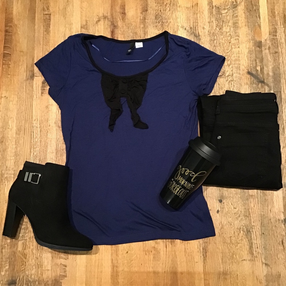 H&M blue top with black bow accent